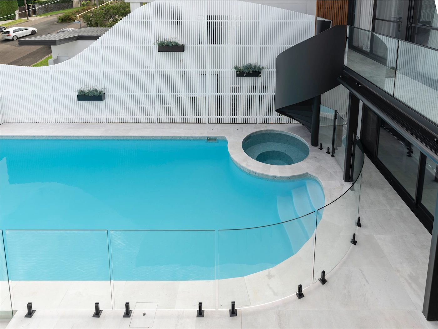 Custom-designed frameless glass pool fencing at a Clontarf residence