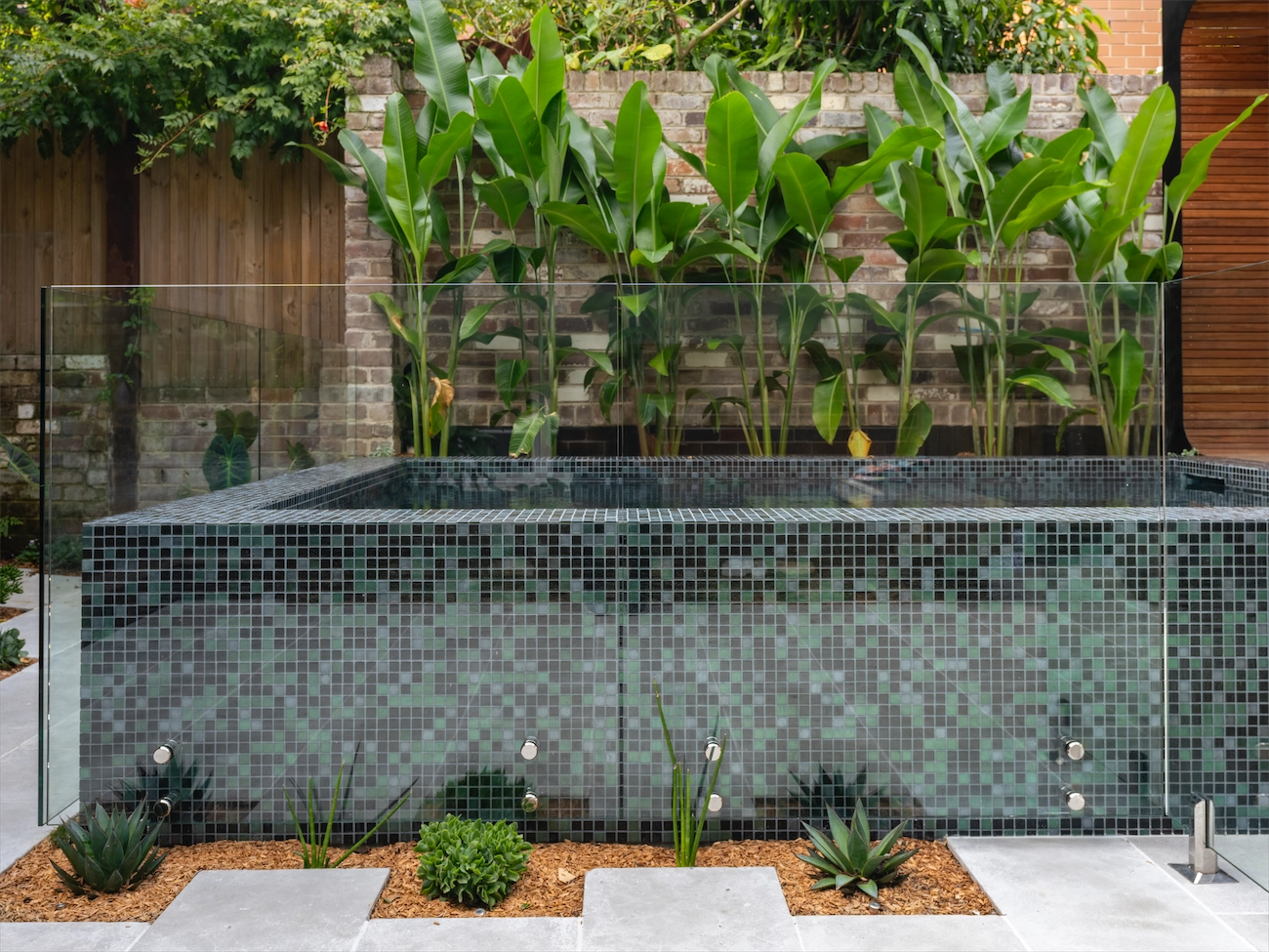 Glebe Residence:&nbsp;Glass fencing can seamlessly integrate with the pool wall